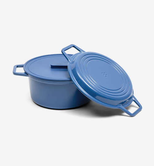 Blue enameled cast iron Dutch oven with lid, two side handles